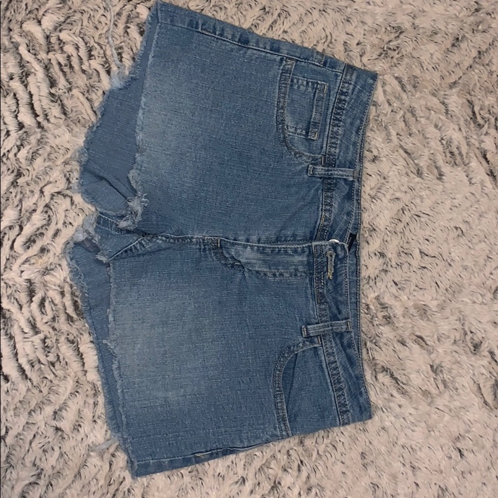 Light wash denim shorts.